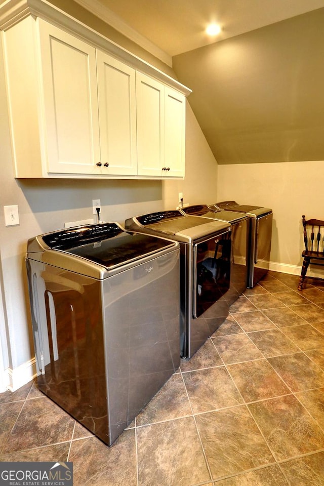 1178 Chambord Way NE, Brookhaven, GA 30319 - laundry area with cabinet space, independent washer and dryer, baseboards, and tile patterned flooring