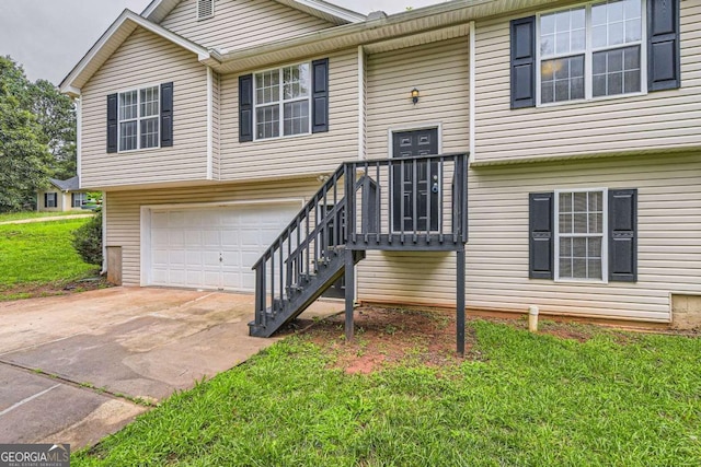 275 Mountain Way, Covington, GA 30016 - raised ranch with a garage, driveway, and a front yard