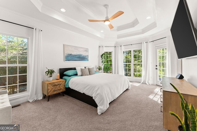 1421 Lane Creek Dr, Bishop, GA 30621 - bedroom with light colored carpet, ornamental molding, a tray ceiling, access to outside, and recessed lighting