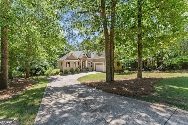 1421 Lane Creek Dr, Bishop, GA 30621 - view of front of house featuring concrete driveway, a front lawn, and an attached garage