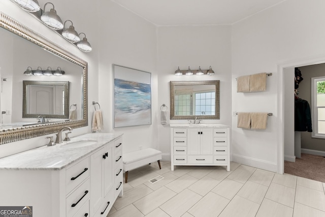 1421 Lane Creek Dr, Bishop, GA 30621 - bathroom featuring two vanities and baseboards