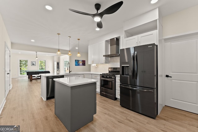 1421 Lane Creek Dr, Bishop, GA 30621 - kitchen featuring black fridge with ice dispenser, dishwasher, stainless steel gas stove, wall chimney exhaust hood, and a sink