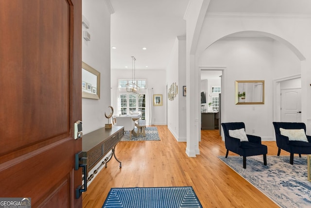 1421 Lane Creek Dr, Bishop, GA 30621 - entryway featuring light wood-style flooring, arched walkways, baseboards, recessed lighting, and a chandelier