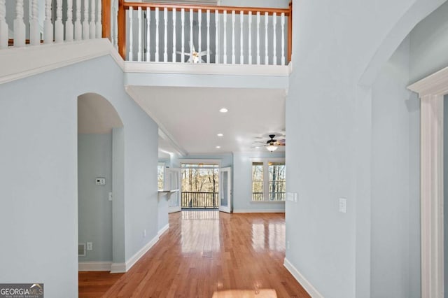 100 Oboe Ct, Ellijay, GA 30540 - entryway with ceiling fan, arched walkways, baseboards, wood finished floors, and recessed lighting