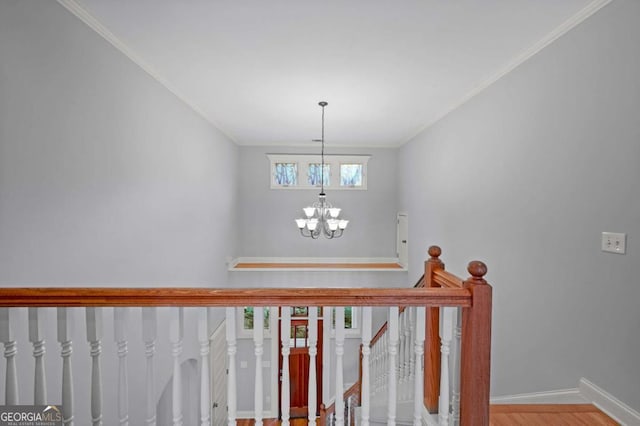 100 Oboe Ct, Ellijay, GA 30540 - stairs with ornamental molding, wood finished floors, a chandelier, and baseboards