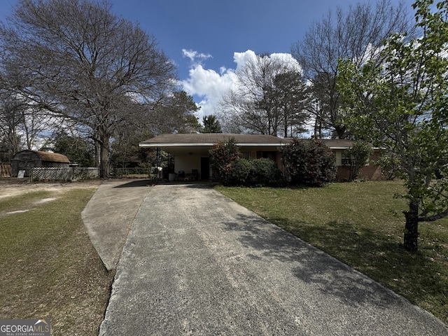 114 Hope Pl, Warner Robins, GA 31088 - view of front of house with concrete driveway and an attached carport