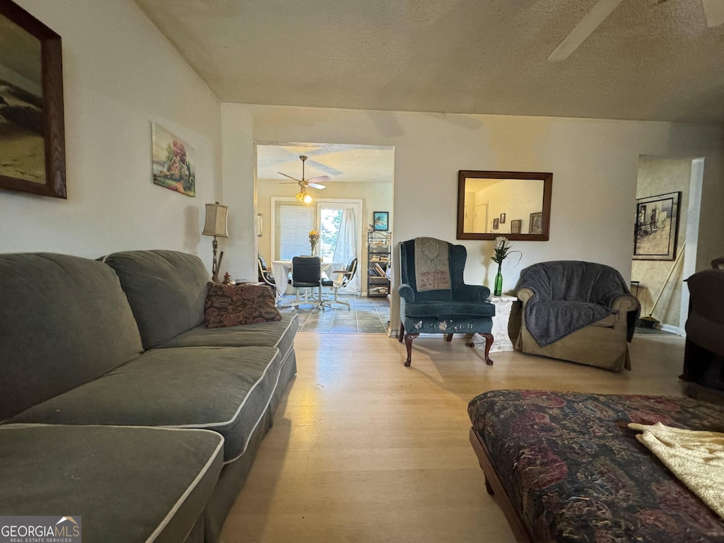 114 Hope Pl, Warner Robins, GA 31088 - living room with a ceiling fan and wood finished floors