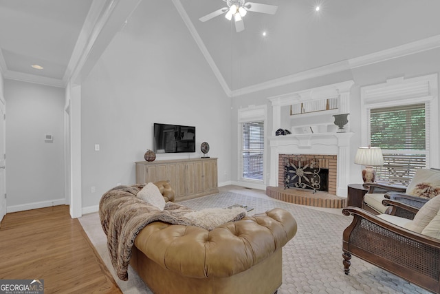 1304 Swallows Walk, Grayson, GA 30017 - living area featuring ceiling fan, high vaulted ceiling, baseboards, wood finished floors, and recessed lighting