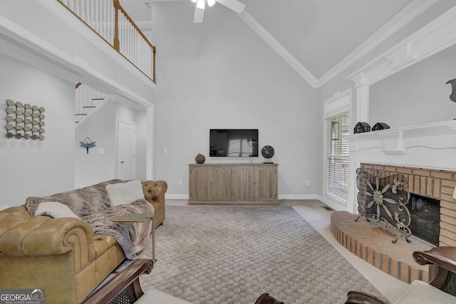 1304 Swallows Walk, Grayson, GA 30017 - carpeted living area featuring high vaulted ceiling, a fireplace, a ceiling fan, crown molding, and baseboards