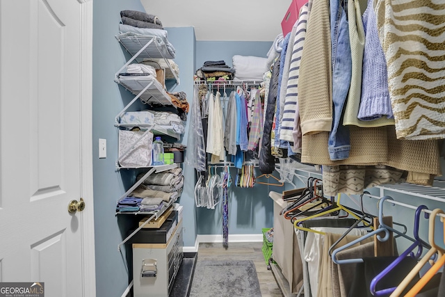 1304 Swallows Walk, Grayson, GA 30017 - spacious closet featuring wood finished floors