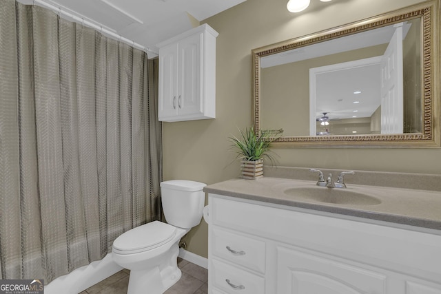 1304 Swallows Walk, Grayson, GA 30017 - bathroom with vanity, toilet, tile patterned floors, and ceiling fan