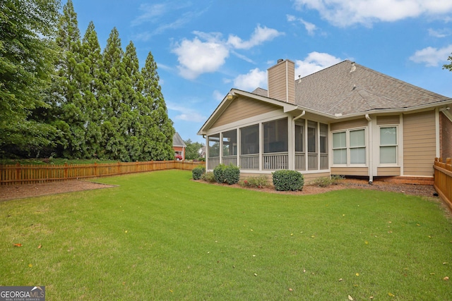 1304 Swallows Walk, Grayson, GA 30017 - rear view of property featuring a chimney, a sunroom, and roof with shingles