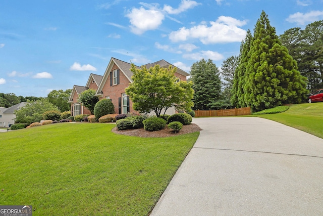 1304 Swallows Walk, Grayson, GA 30017 - view of front facade featuring driveway and brick siding