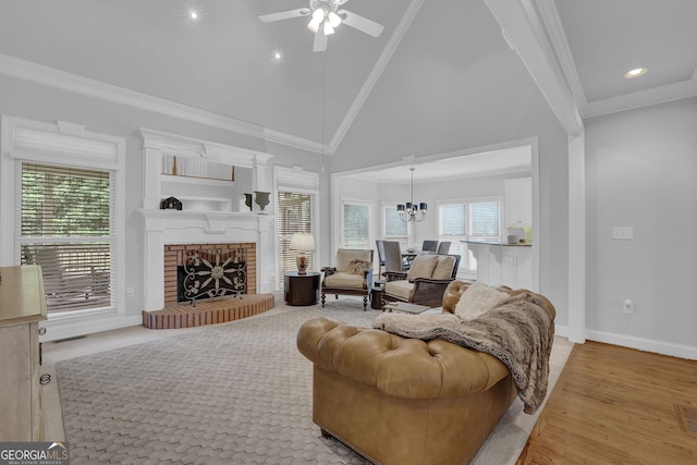 1304 Swallows Walk, Grayson, GA 30017 - living room featuring high vaulted ceiling, plenty of natural light, a ceiling fan, baseboards, and a fireplace