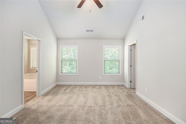 422 Dublin Way, Dallas, GA 30132 - unfurnished bedroom with carpet, vaulted ceiling, baseboards, and ceiling fan