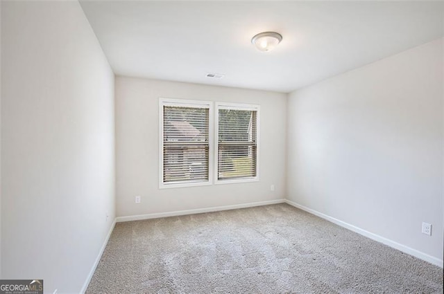 422 Dublin Way, Dallas, GA 30132 - carpeted spare room with baseboards