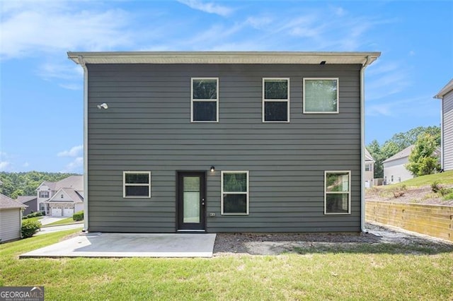 422 Dublin Way, Dallas, GA 30132 - rear view of house with a patio and a yard