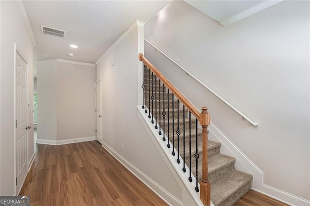 422 Dublin Way, Dallas, GA 30132 - staircase featuring wood finished floors, baseboards, crown molding, and recessed lighting