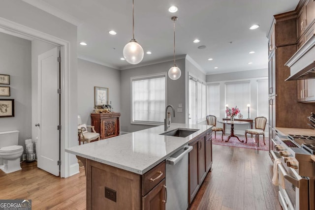 345 Glen Iris Dr NE Unit 3, Atlanta, GA 30312 - kitchen featuring dishwasher, high end range, hardwood / wood-style flooring, a center island with sink, and recessed lighting