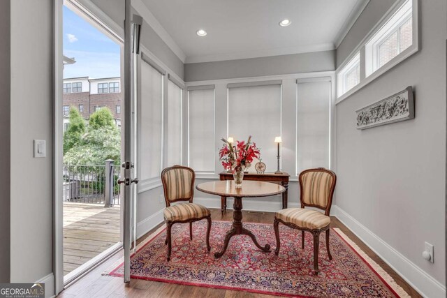 345 Glen Iris Dr NE Unit 3, Atlanta, GA 30312 - living area with plenty of natural light, wood finished floors, recessed lighting, and crown molding