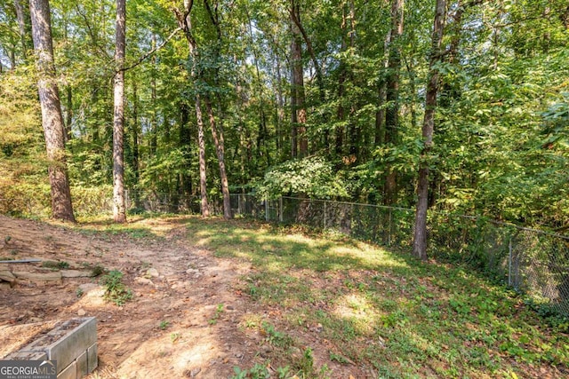 2849 Crescendo Dr, Atlanta, GA 30318 - view of yard featuring a forest view