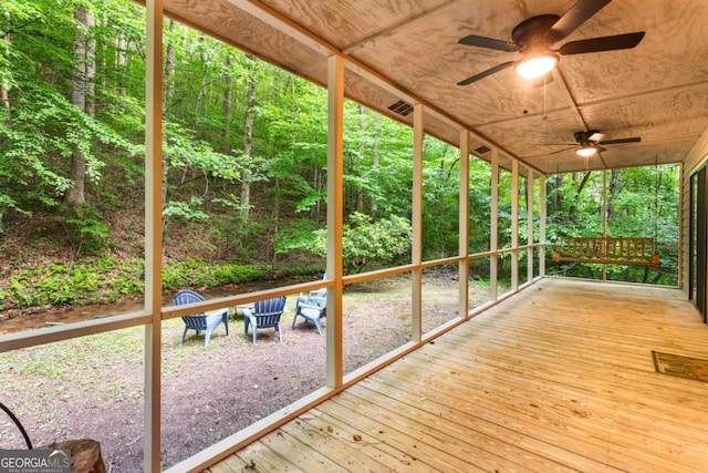 62 Nocona Trl, Ellijay, GA 30536 - wooden terrace with a ceiling fan and a wooded view
