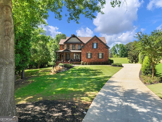 70 Baker Pond Ct, Jefferson, GA 30549 - craftsman inspired home featuring a front yard and brick siding