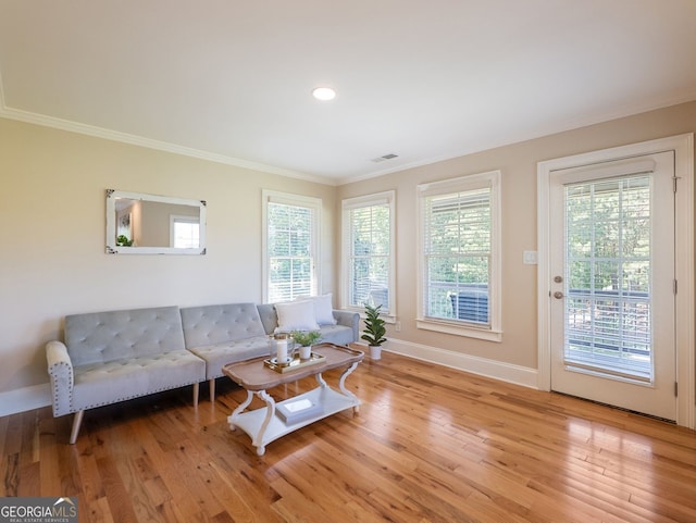 70 Baker Pond Ct, Jefferson, GA 30549 - living area featuring crown molding, baseboards, plenty of natural light, wood finished floors, and recessed lighting