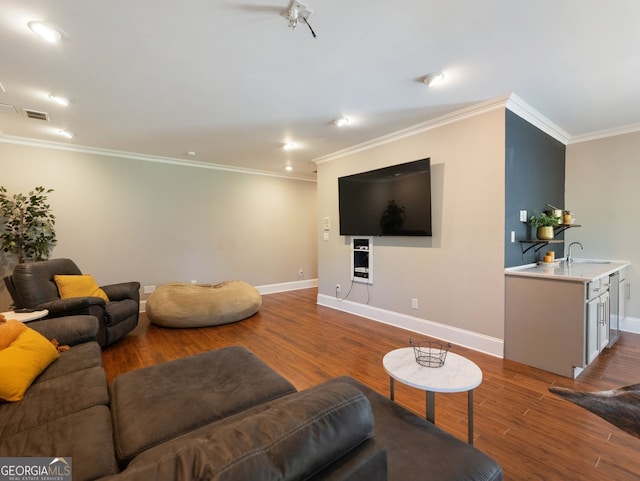 70 Baker Pond Ct, Jefferson, GA 30549 - living area with baseboards, wood finished floors, ornamental molding, and recessed lighting