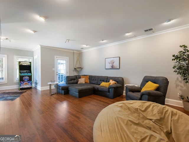 70 Baker Pond Ct, Jefferson, GA 30549 - living room with wood finished floors, baseboards, and crown molding