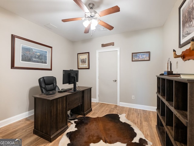 70 Baker Pond Ct, Jefferson, GA 30549 - home office featuring ceiling fan, light wood-style floors, and baseboards