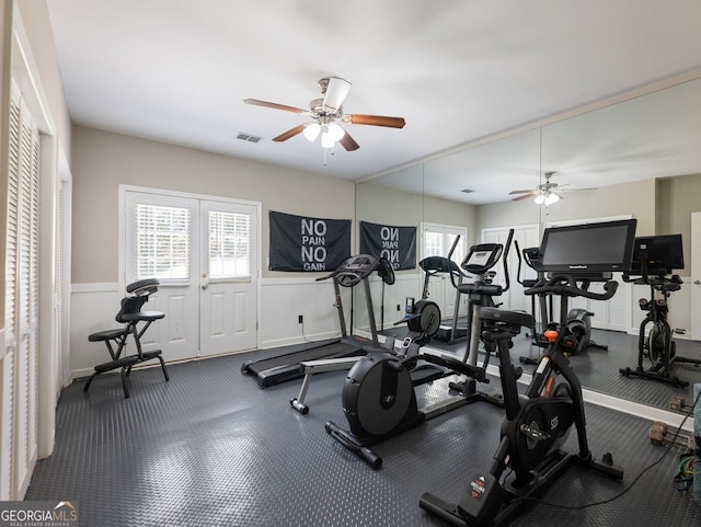 70 Baker Pond Ct, Jefferson, GA 30549 - workout area featuring ceiling fan, carpet flooring, and a wainscoted wall