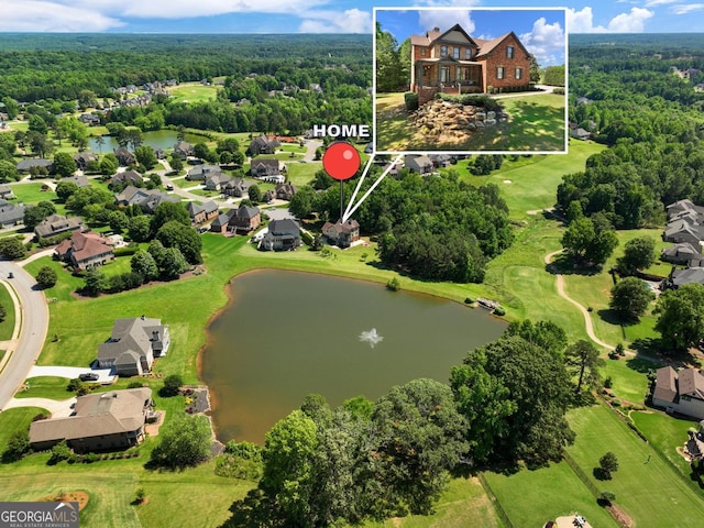 70 Baker Pond Ct, Jefferson, GA 30549 - aerial perspective of suburban area featuring a large body of water, property parcel outlined, and a heavily wooded area