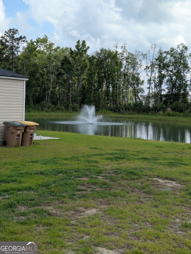 310 Lillian St, Rincon, GA 31326 - view of green lawn with a water view