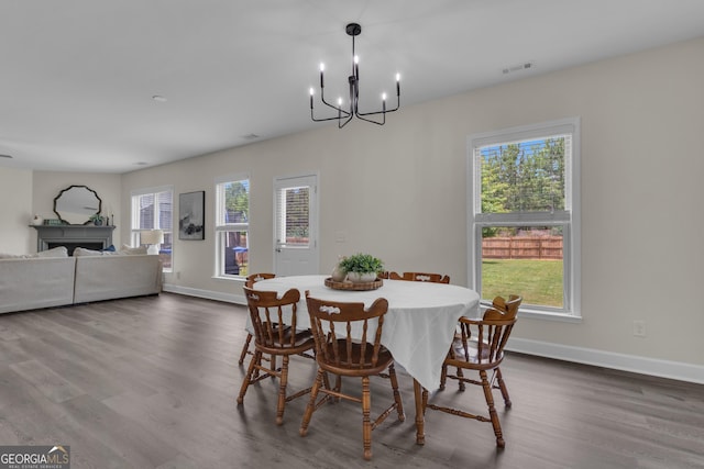 206 Roundwood Way, Peachtree City, GA 30269 - dining room with a chandelier and dark wood-style flooring