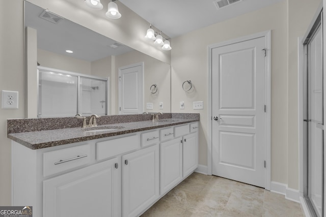 206 Roundwood Way, Peachtree City, GA 30269 - full bathroom featuring double vanity and a stall shower