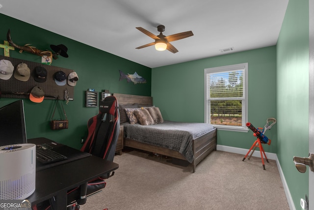 206 Roundwood Way, Peachtree City, GA 30269 - carpeted bedroom with a ceiling fan and baseboards