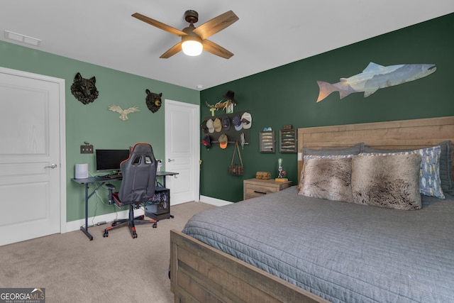 206 Roundwood Way, Peachtree City, GA 30269 - carpeted bedroom with baseboards and a ceiling fan
