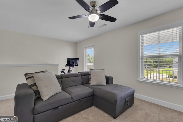206 Roundwood Way, Peachtree City, GA 30269 - living area featuring light colored carpet and a ceiling fan