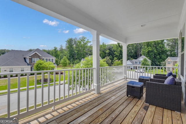 206 Roundwood Way, Peachtree City, GA 30269 - wooden terrace with view of scattered trees and a residential view