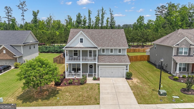 206 Roundwood Way, Peachtree City, GA 30269 - view of front of house with a porch, driveway, roof with shingles, a garage, and a balcony