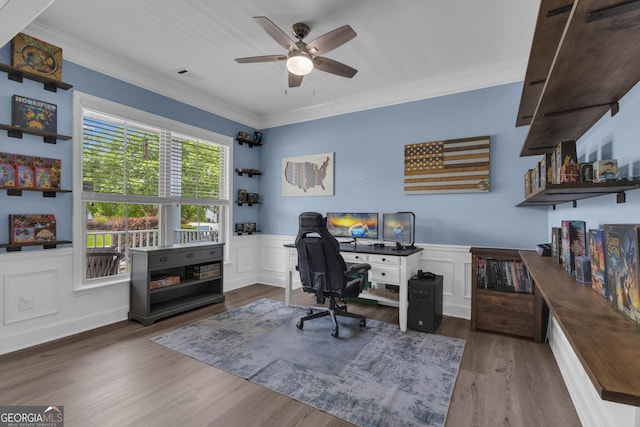206 Roundwood Way, Peachtree City, GA 30269 - office with ceiling fan, crown molding, wood finished floors, a wainscoted wall, and a decorative wall
