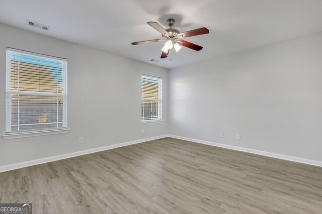 17 Sandy Point Way, Port Wentworth, GA 31407 - spare room with wood finished floors, baseboards, and a ceiling fan