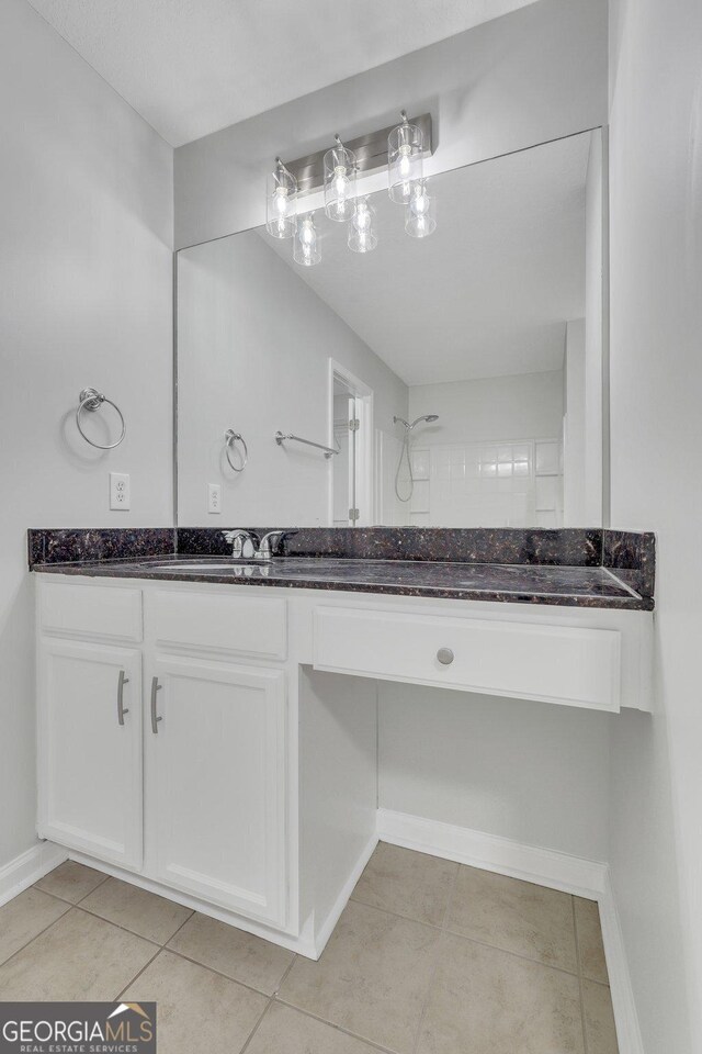 17 Sandy Point Way, Port Wentworth, GA 31407 - bathroom featuring vanity, tile patterned floors, and baseboards