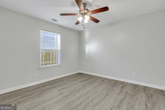 17 Sandy Point Way, Port Wentworth, GA 31407 - unfurnished room with wood finished floors, baseboards, and ceiling fan