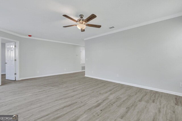 17 Sandy Point Way, Port Wentworth, GA 31407 - unfurnished room featuring ceiling fan, ornamental molding, baseboards, and wood finished floors