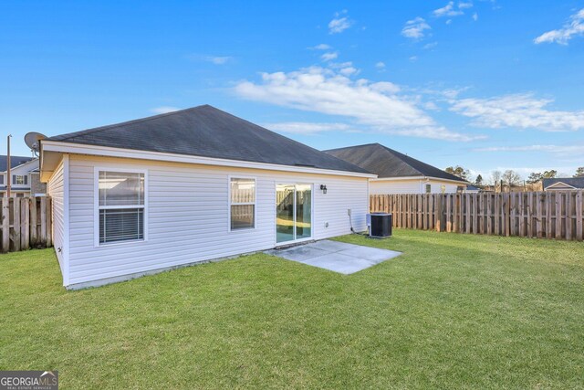 17 Sandy Point Way, Port Wentworth, GA 31407 - back of property with central AC and a patio