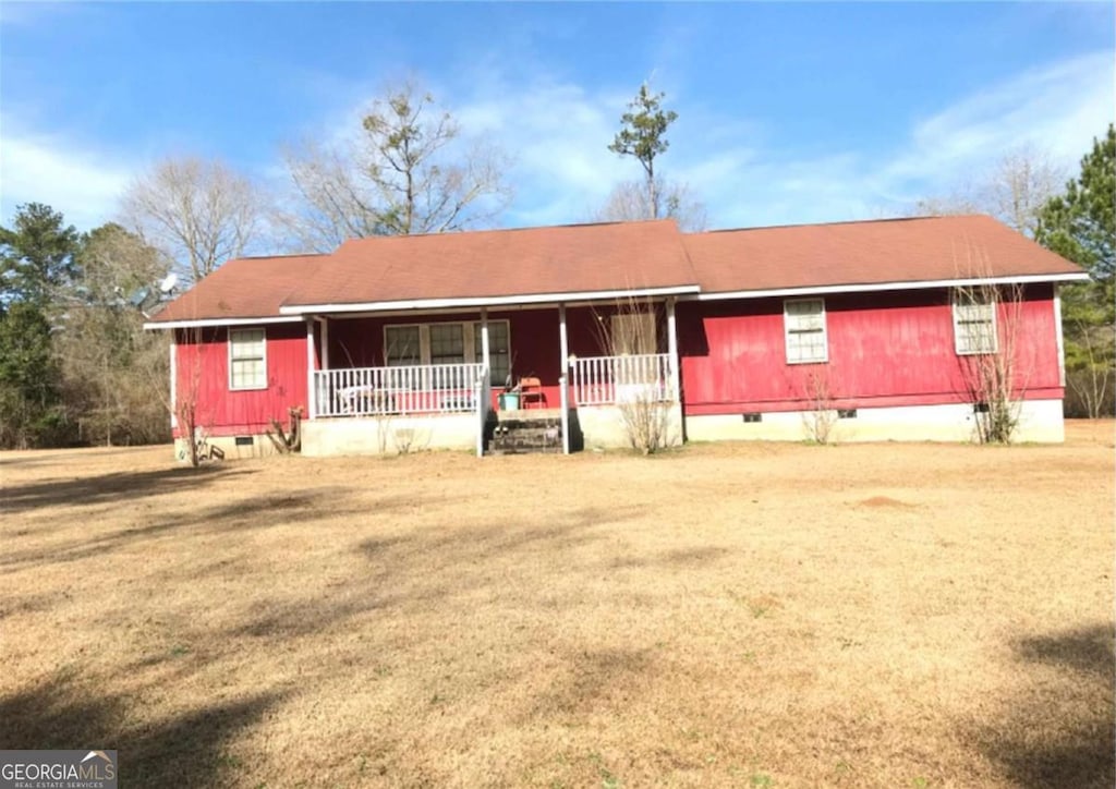 2970 Frederick Dr, Dry Branch, GA 31020 - ranch-style house featuring crawl space, covered porch, and a front lawn