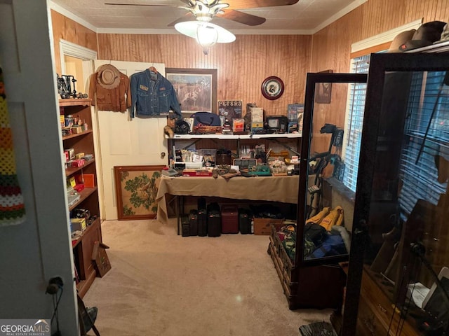 1268 Woodland Rd NE, Conyers, GA 30012 - home office with crown molding, carpet floors, wood walls, and a ceiling fan