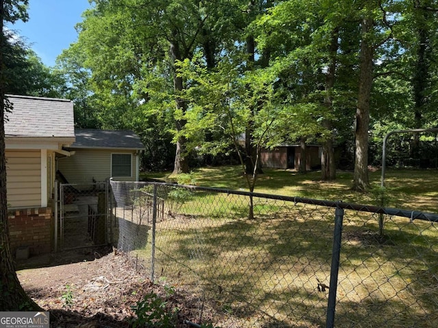 1268 Woodland Rd NE, Conyers, GA 30012 - view of yard with a gate